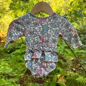 Kate Quinn Long Sleeve Ruffle Bodysuit 3-6m